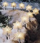 Line the pathway with ‘snowflake’ or ‘star-shaped’ lights available in most stores.